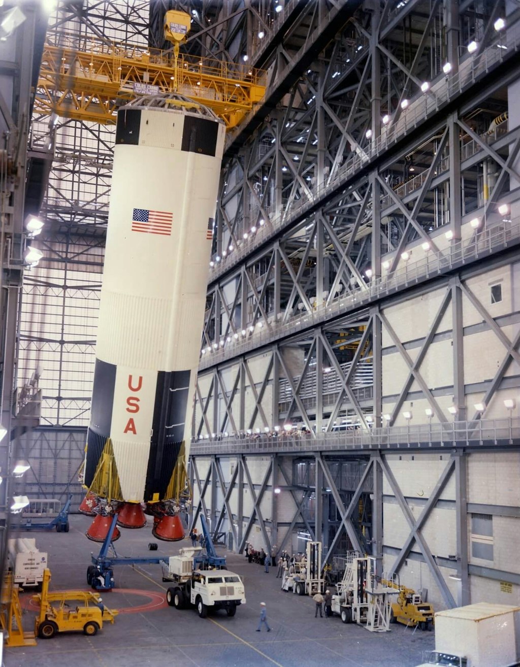 The S-IC first stage of the Apollo 8 Saturn V moved into place for stacking in the Vehicle Assembly Building (VAB) at the Kennedy Space Center on February 1, 1968. Photo courtesy of NASA.