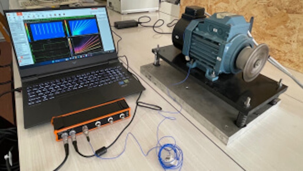 Figure 3. The Krypton data acquisition system and the accelerometer on the operating motor.