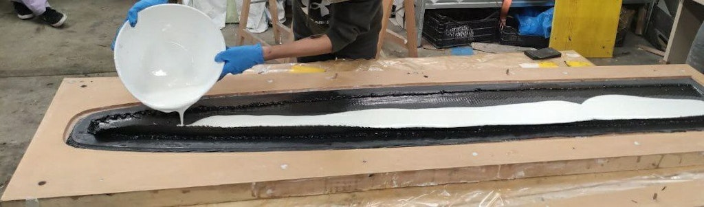 Figure 2. Pouring the epoxy-expanding foam.