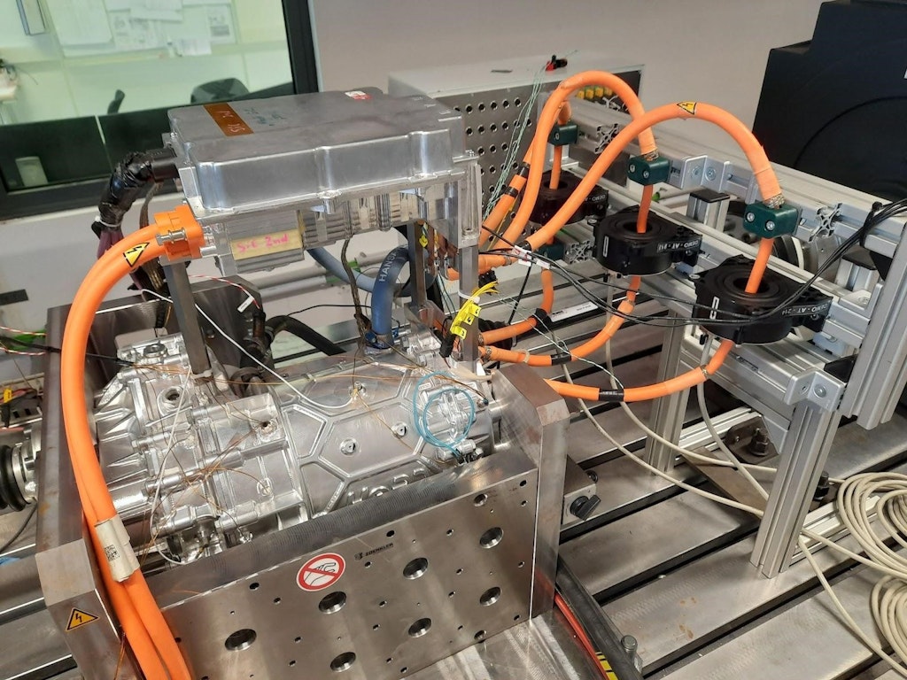 Figure 3. The mounted 3-phase zero flux transducers - the three black boxes on the top right, to the left, you see the inverter on top of the gearbox motor.