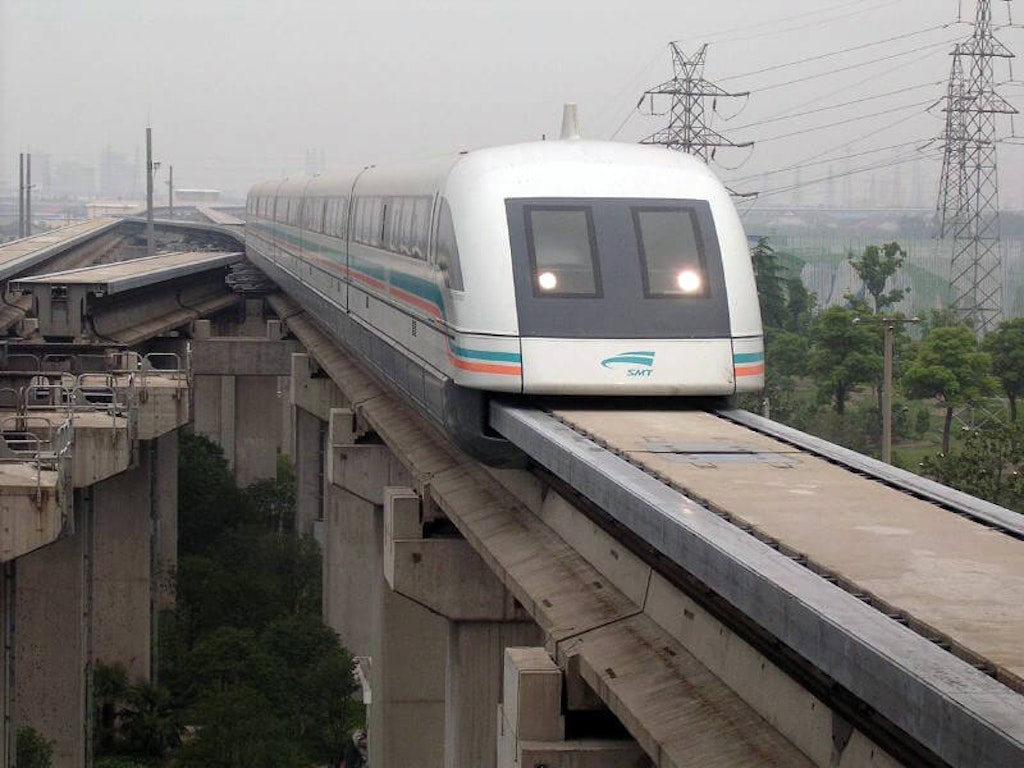 A Shanghai Transrapid train approaches the station