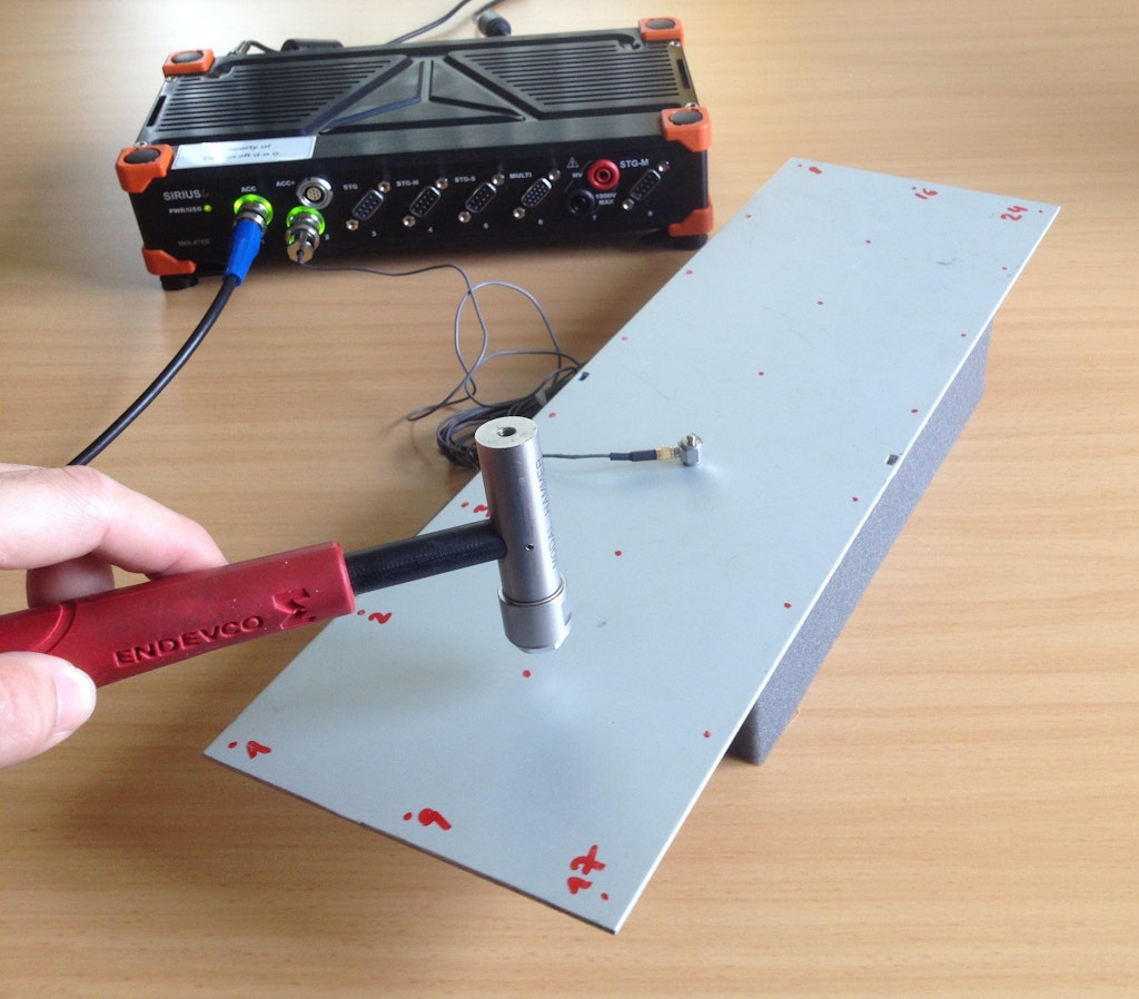 Impact hammer modal measurement on a metal plate