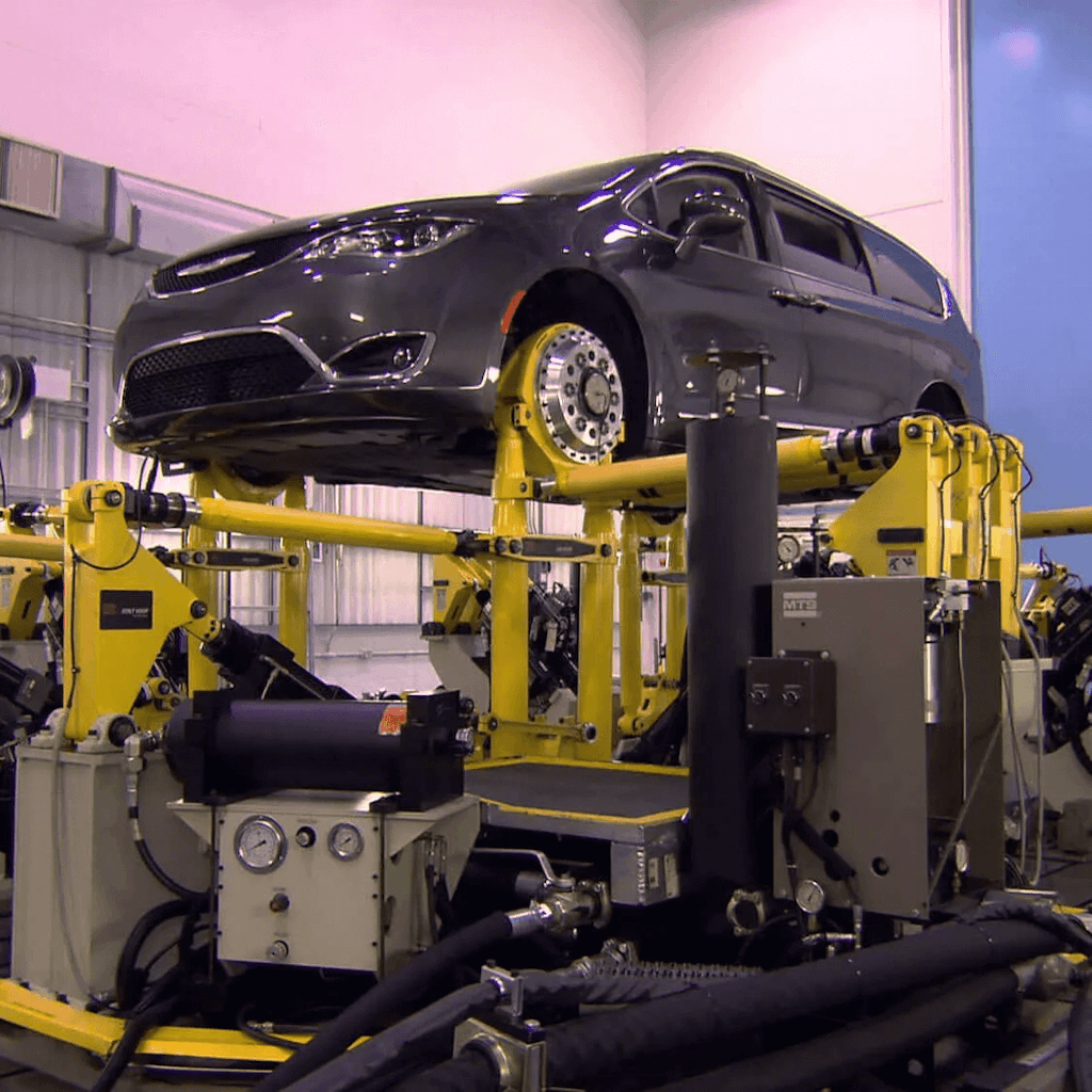 Road Load data captured by a Dewesoft DAQ system is replayed by an MTS “four poster”  simulator to perform durability testing