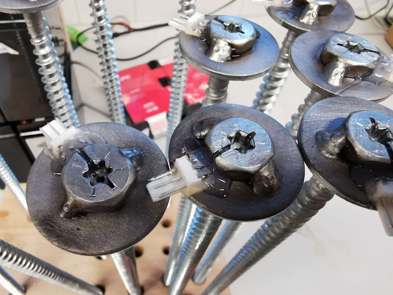 Instrumented Screws containing strain gauges for force measurement