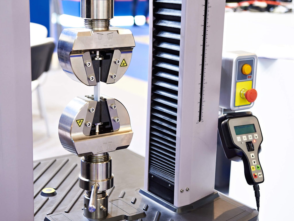 Universal electro-mechanical testing tensile machine. Licensed from Shutterstock.