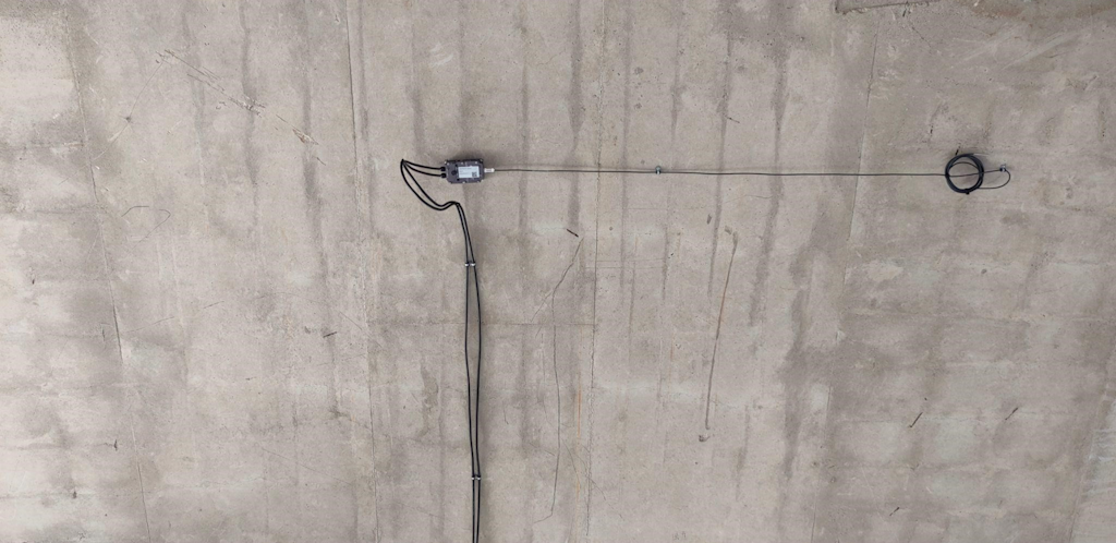 Figure 1. IOLITEiw-3xMEMS-ACC-8g-T module attached to the soffit of a bridge deck.