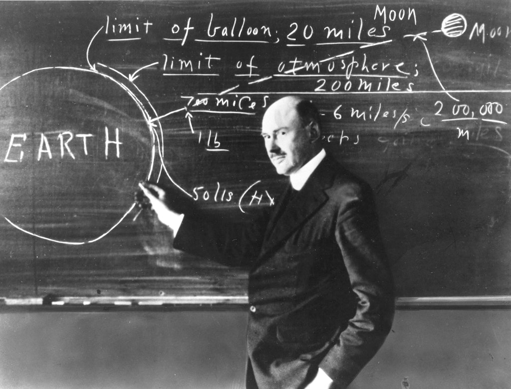 Dr. Robert Goddard at Clark University. Photo by NASA, Public domain, via Wikimedia Commons.