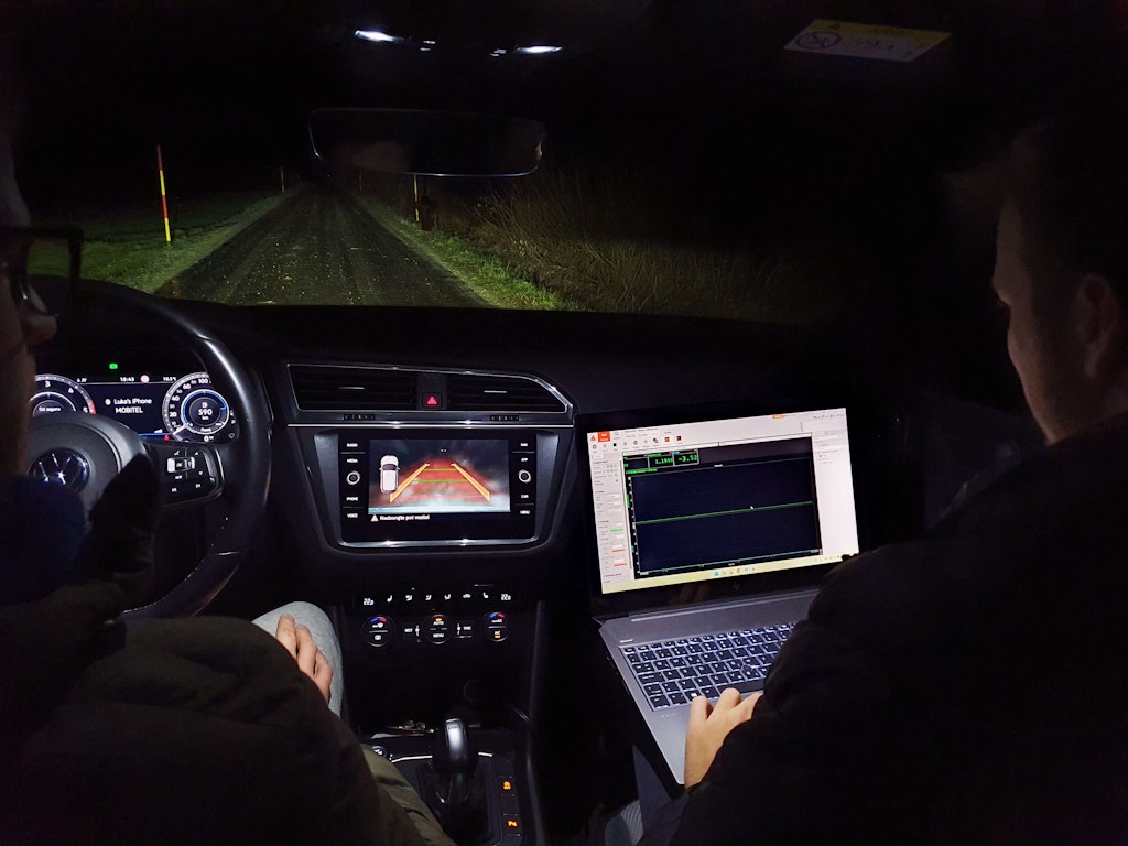 Figure 3. The SIRIUS-UNI device was installed inside the vehicle and connected to a laptop, allowing the operator to monitor sensor values in real-time.