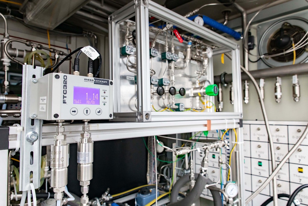 Figure 6. Small amounts of hydrogen diffuse through the membrane to the anode side; the percentage of H2 in O2 is measured during the test. Measuring the quantity of hydrogen produced is a challenge. The Coriolis sensor must not get humid. The gas is cooled and dehumidified. An online mass spectrometer in the gas lab checks the quality of the produced gas.