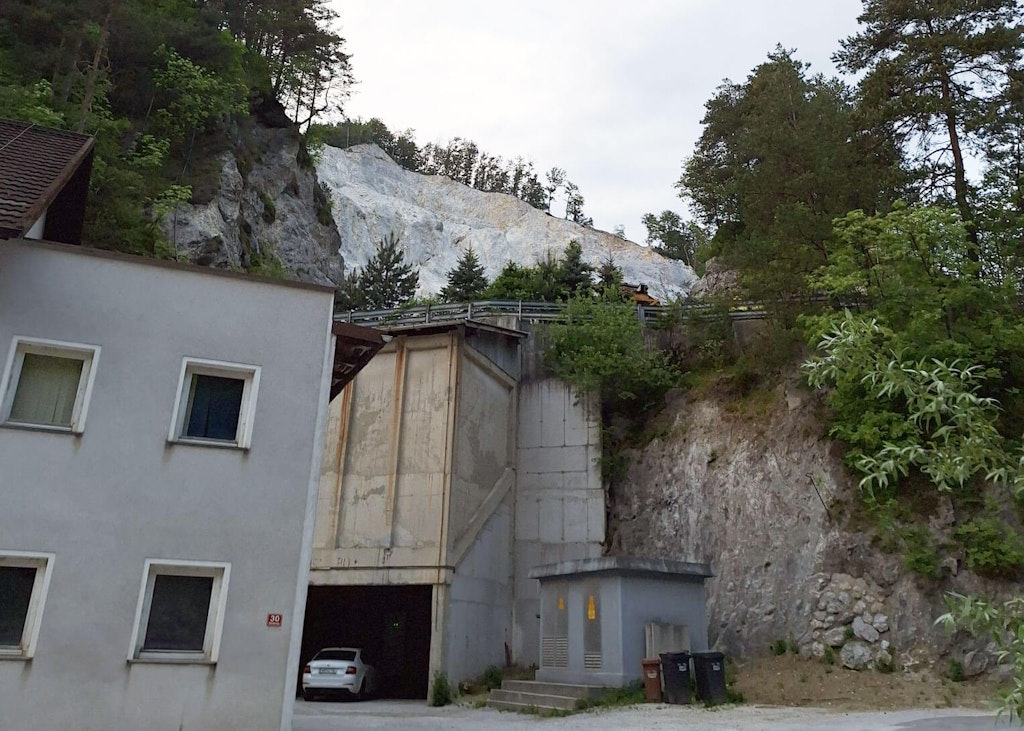Figure 1. The quarry is near the house.