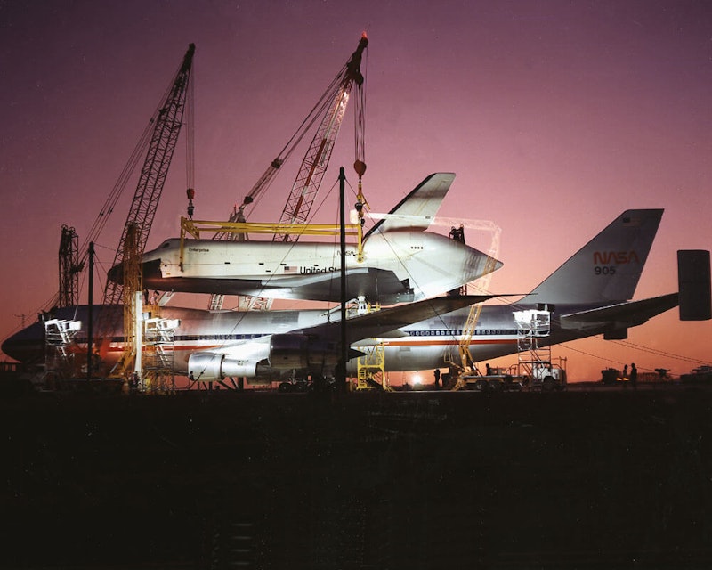 he Shuttle Orbiter Enterprise is off-loaded at Redstone Arsenal (adjacent to the Marshall Space Flight Center) for Mated Vertical Ground Vibration tests (MVGVT). he Shuttle Orbiter Enterprise is off-loaded at Redstone Arsenal (adjacent to the Marshall Space Flight Center) for Mated Vertical Ground Vibration tests (MVGVT).