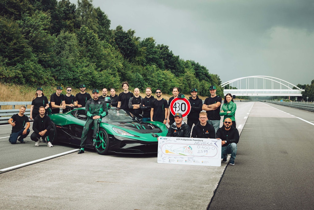 Teamwork behind the record-breaking performance, featuring Rimac and Dewesoft engineers with the Nevera R at ATP Papenburg. Image courtesy of Rimac Automobili.