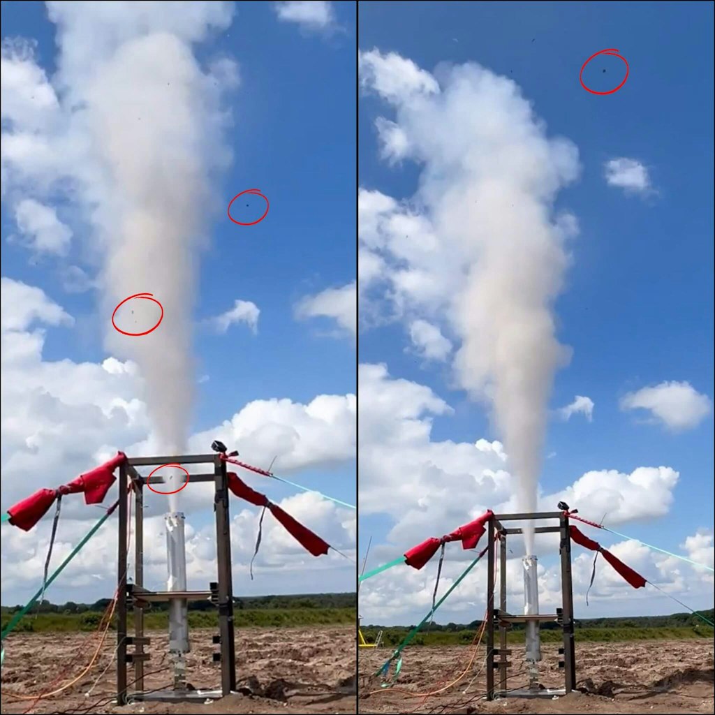 Debris exiting the motor during the static fire test.