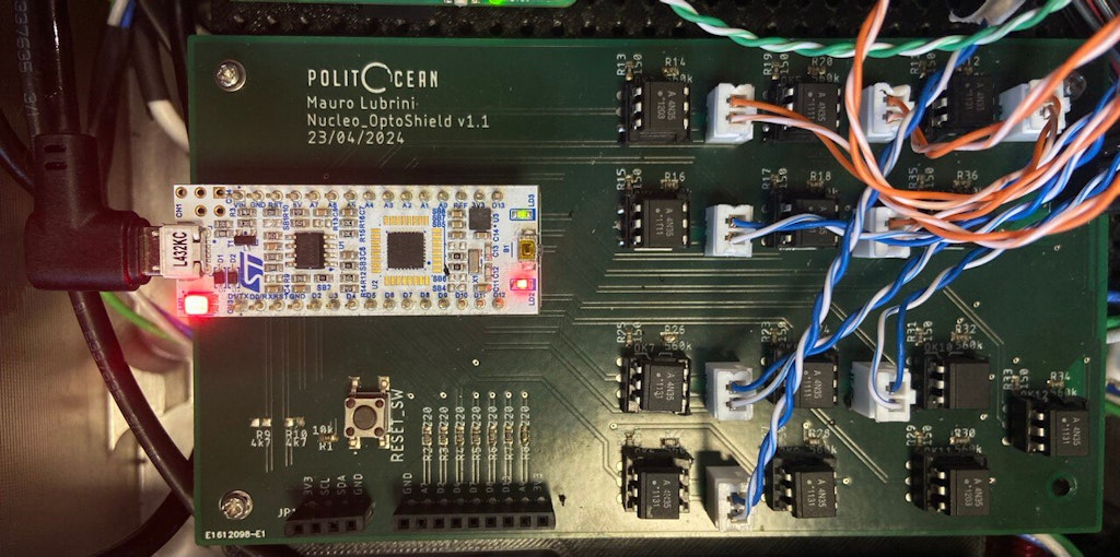 The ST Nucleo is on top of the Opto board.
