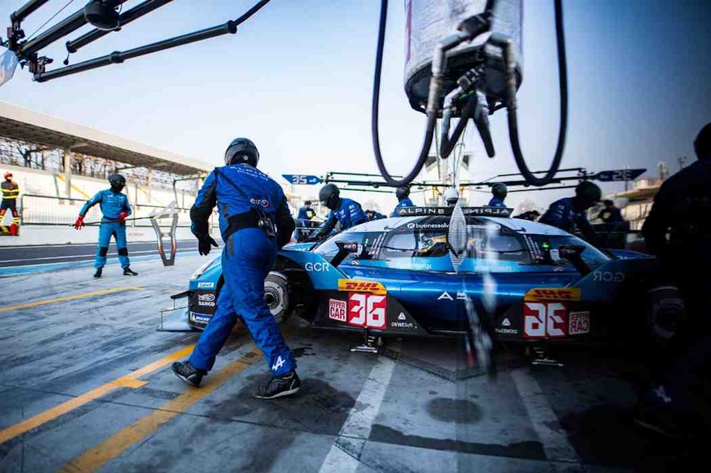 The Alpine crew works like a well-oiled machine to support their cars and drivers. Note the Dewesoft logo on the vehicle. 