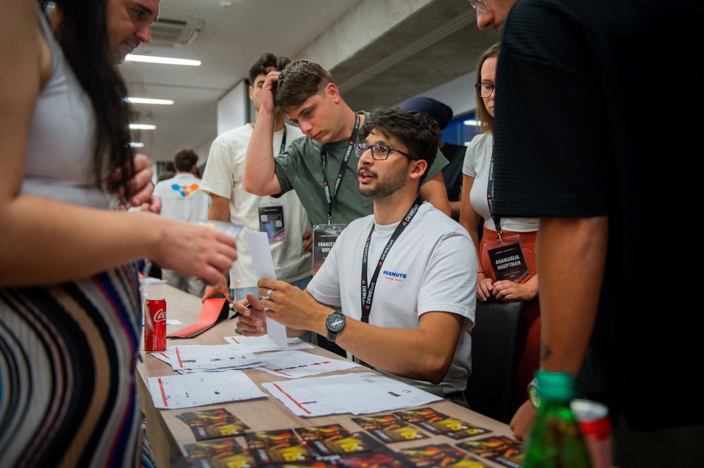 The bidding begins as teams compete for cars, parts, and experts