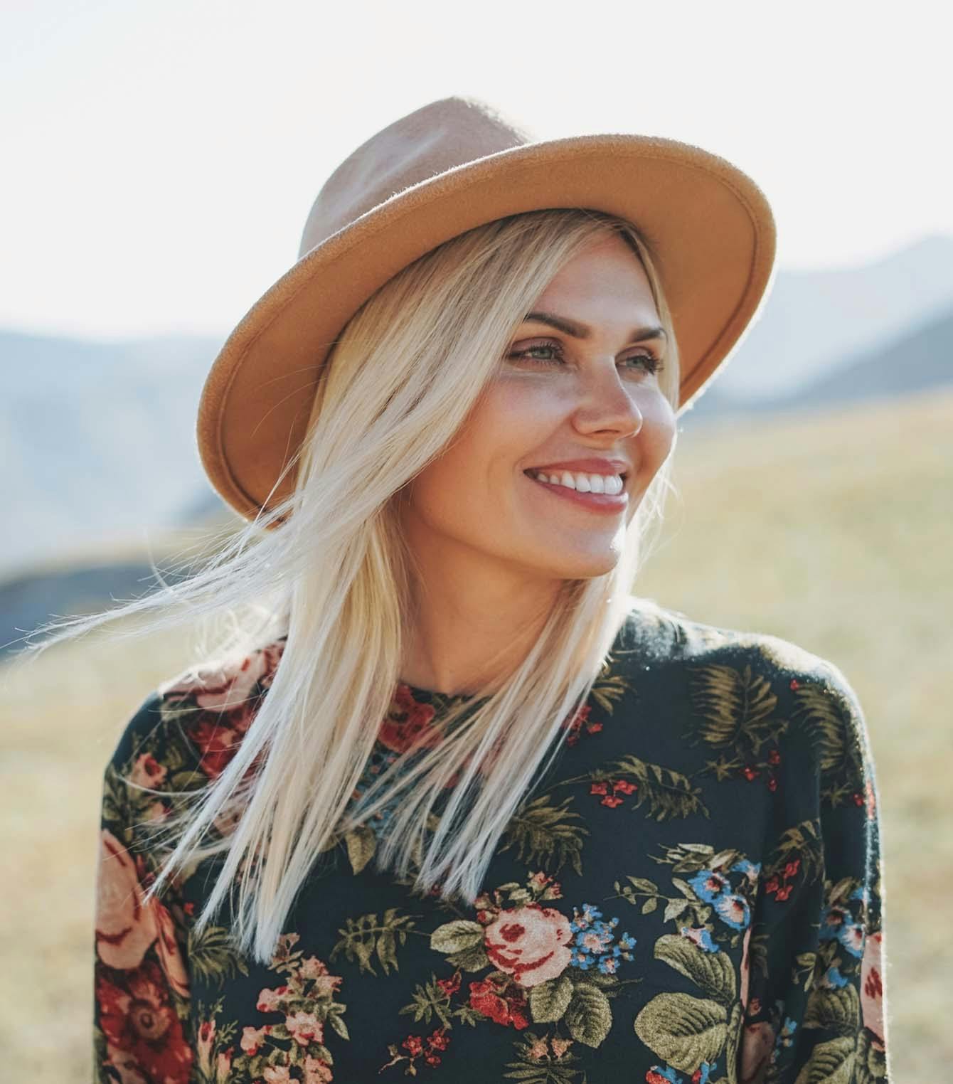 Blonde Woman with a Beige Hat