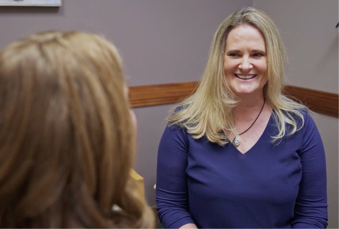 Patient at Modern Women's Health speaking with staff