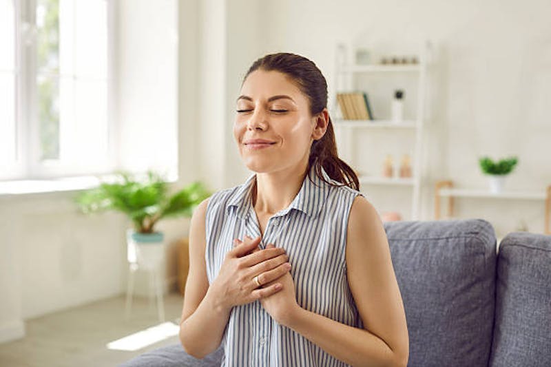 Woman Holding Her Heart
