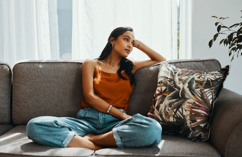 Woman sitting on the couch