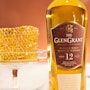 https://www.datocms-assets.com/53554/1650986498-glen-grant-12-yr_02.jpg?auto=format&h=90