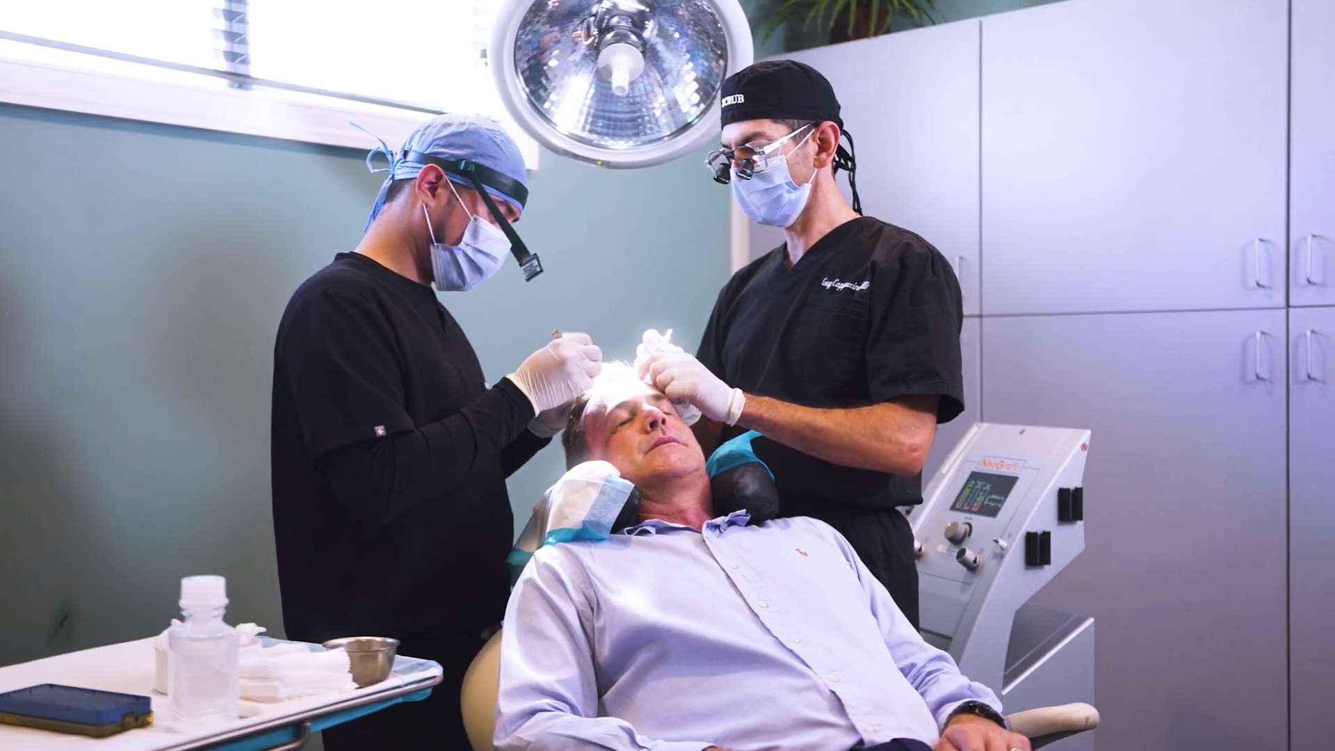 an image of Dr. Cappuccino conducting a hair transplant procedure on a patient