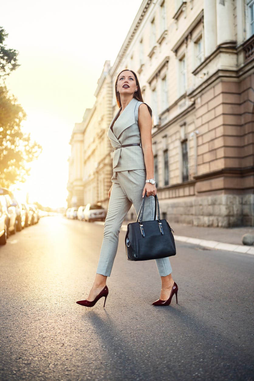 woman in blue pant suit