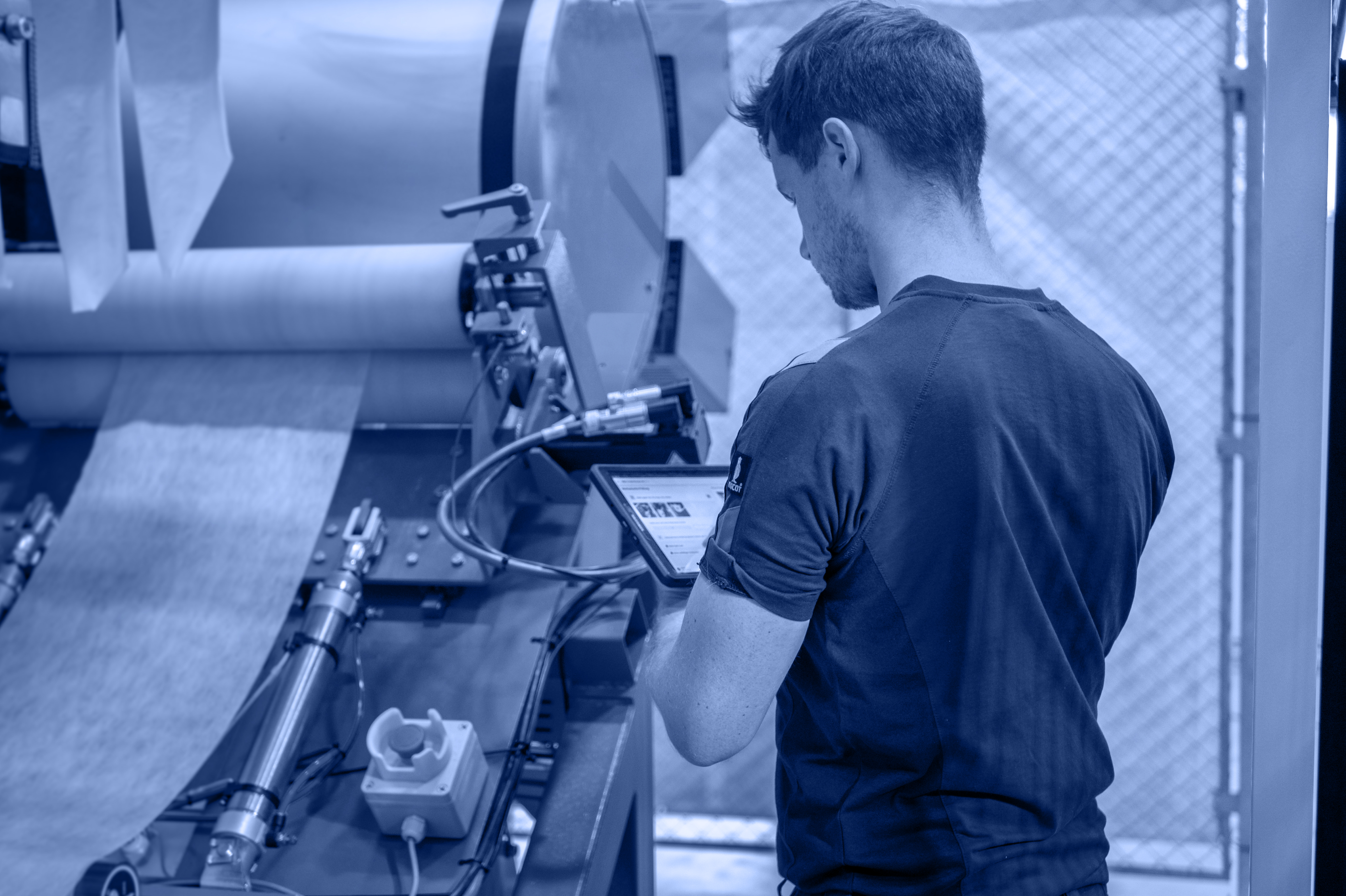 Worker with tablet and digital checklist