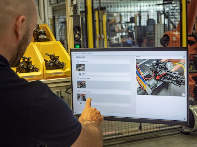 Adaptive processes as the evolution of the paperless factory