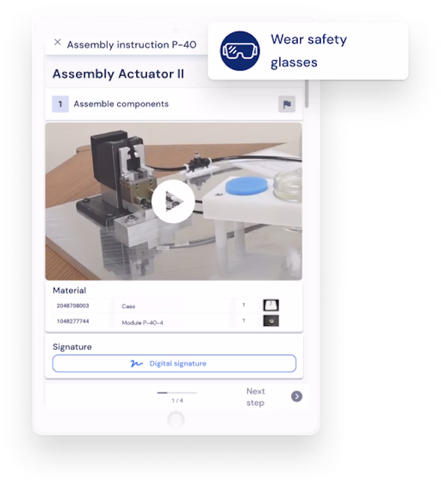Dateiname:image--2-.png (Montageanweisung P-4) Tablet showing digital assembly instruction P-4 for assembling a component, with a video guide and materials list. Screenshot shows step 1 "Assemble components" of the work instruction "Montage Aktor II," featuring a playable video of an assembled part, a materials table, and a digital signature field. Process step of an assembly instruction with a "wear safety goggles" prompt, a video on component P-40-4, and a progress indicator showing step 1 of 4.