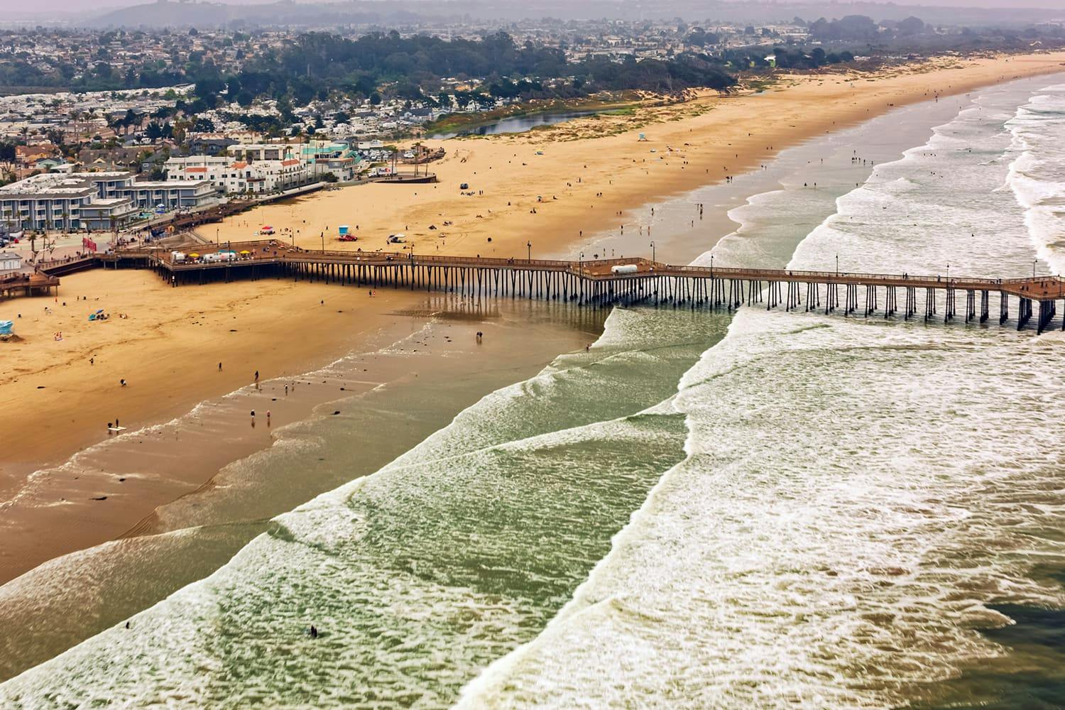The beach with a pier