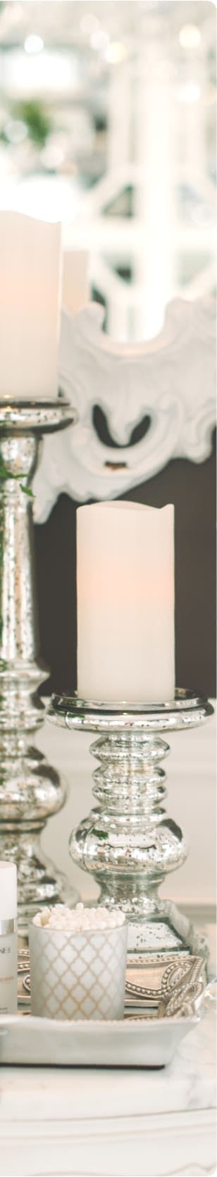 Lit candles in holders