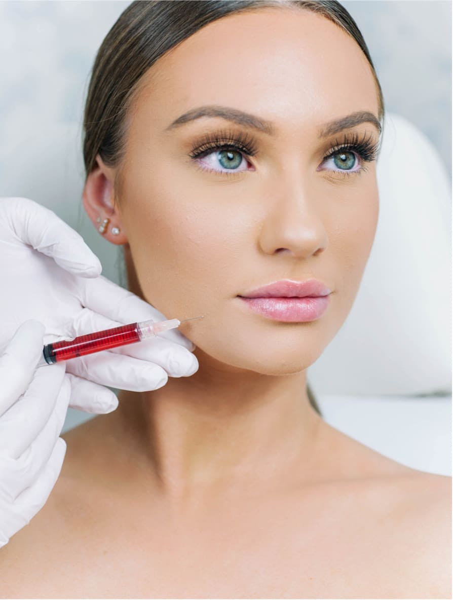 woman getting an injection in lips
