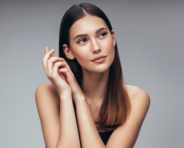 Woman who got BBL® HERO treatment