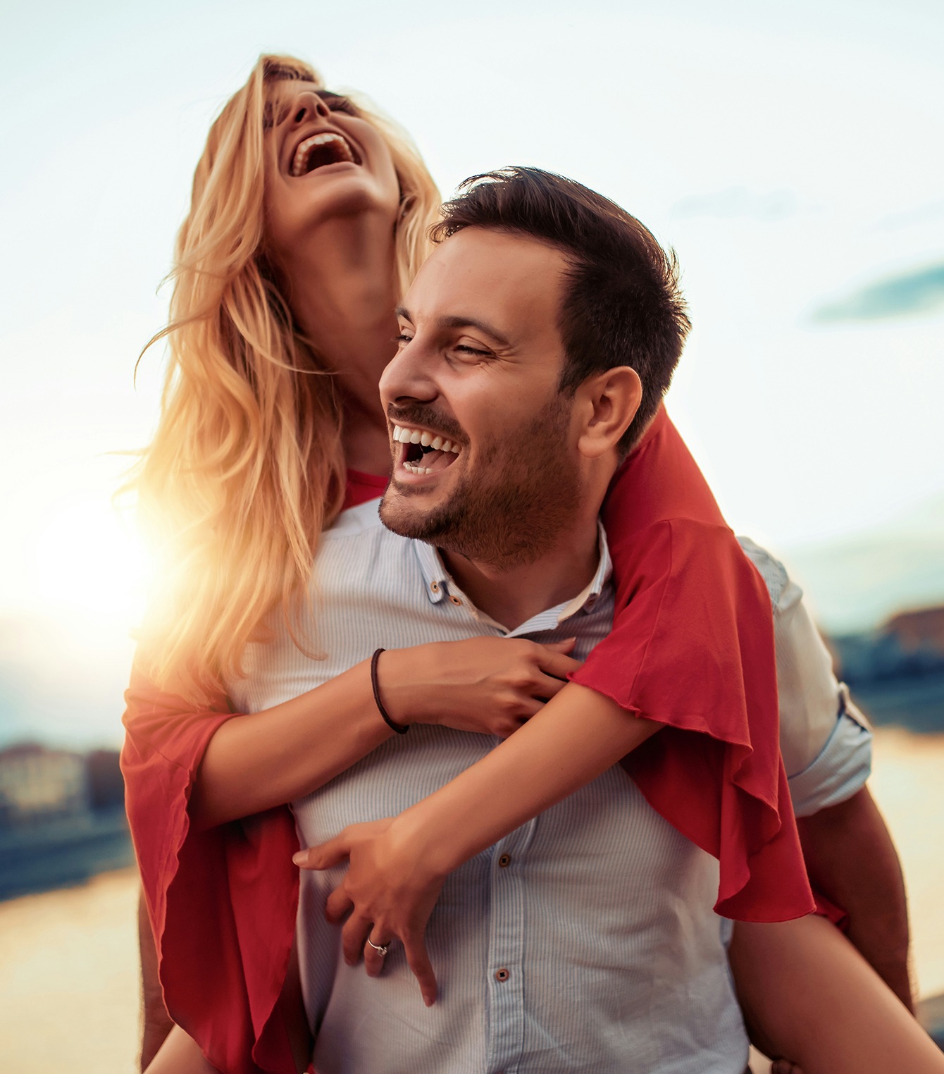 Couple laughing and embracing