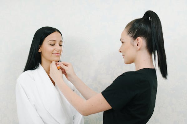 doctor and patient consulting Jeuveau injection