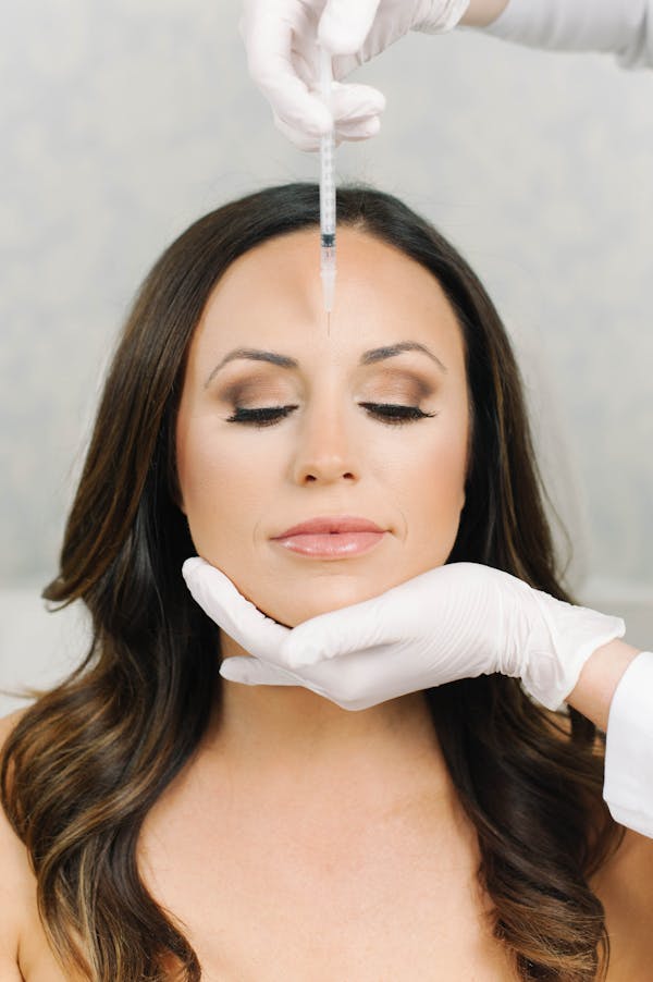 Woman getting Xeomin injected