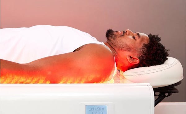 Patient receiving LightStim™ LED Bed treatment