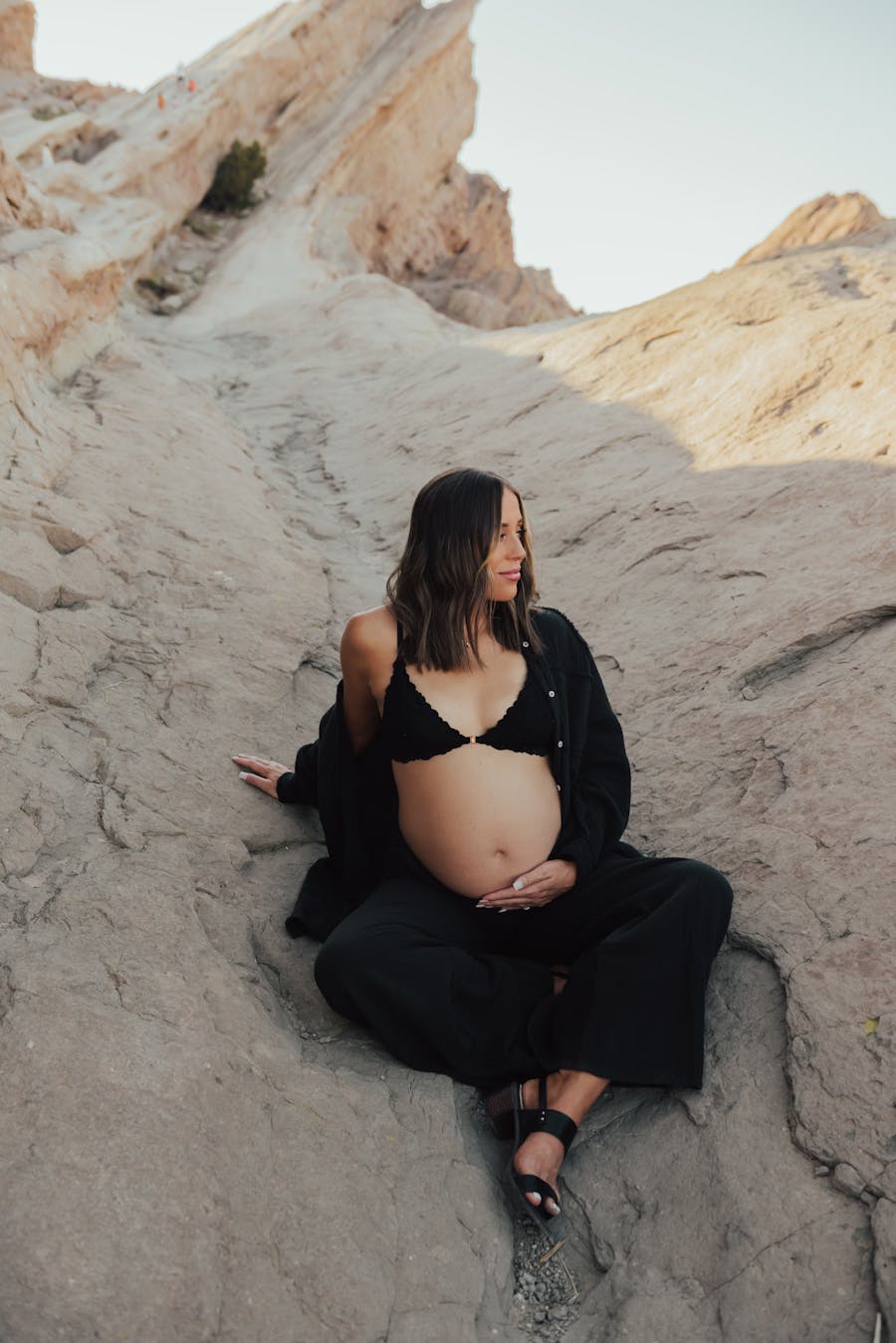 pregnant woman on rocks