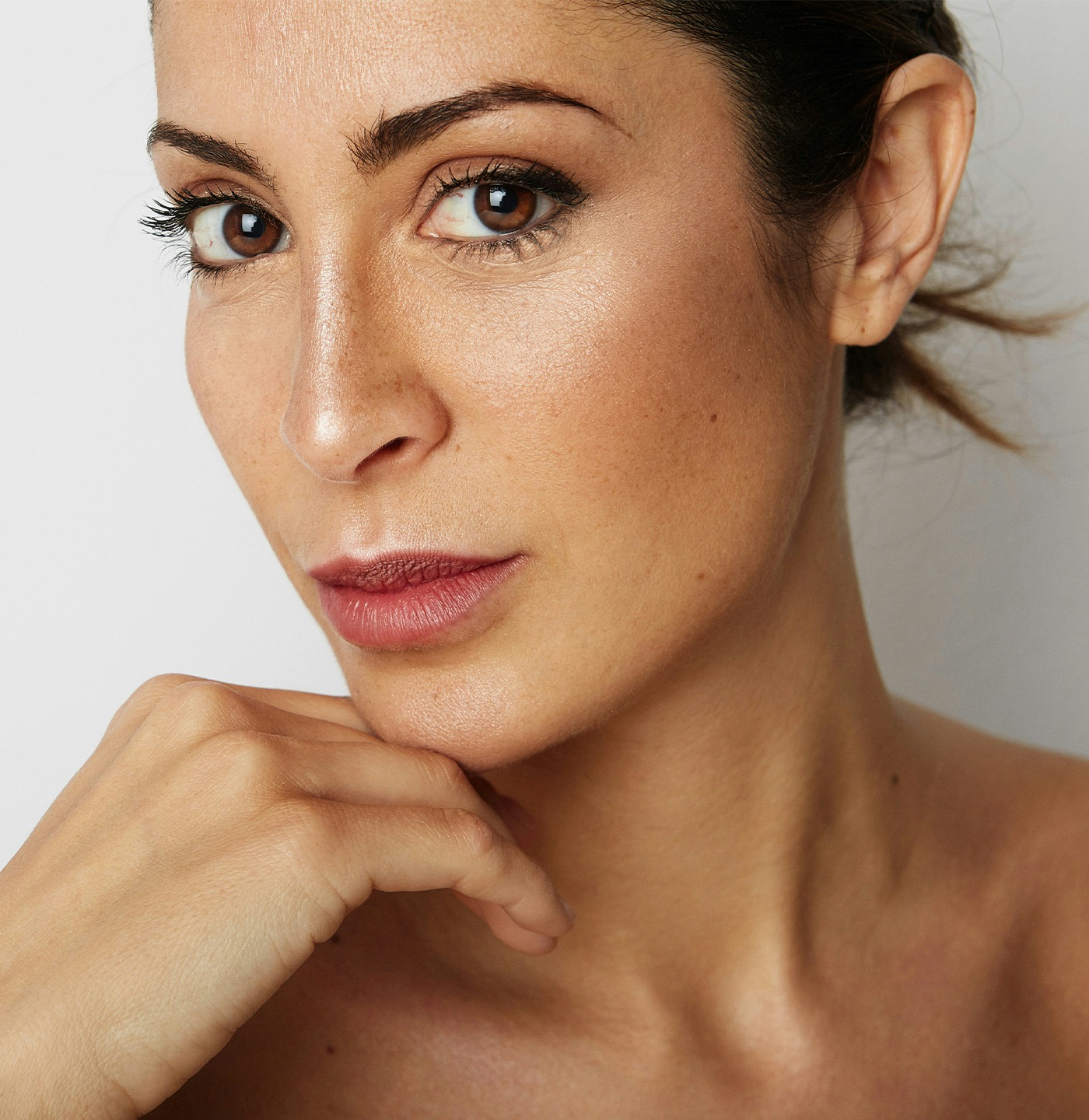 Woman touching her chin