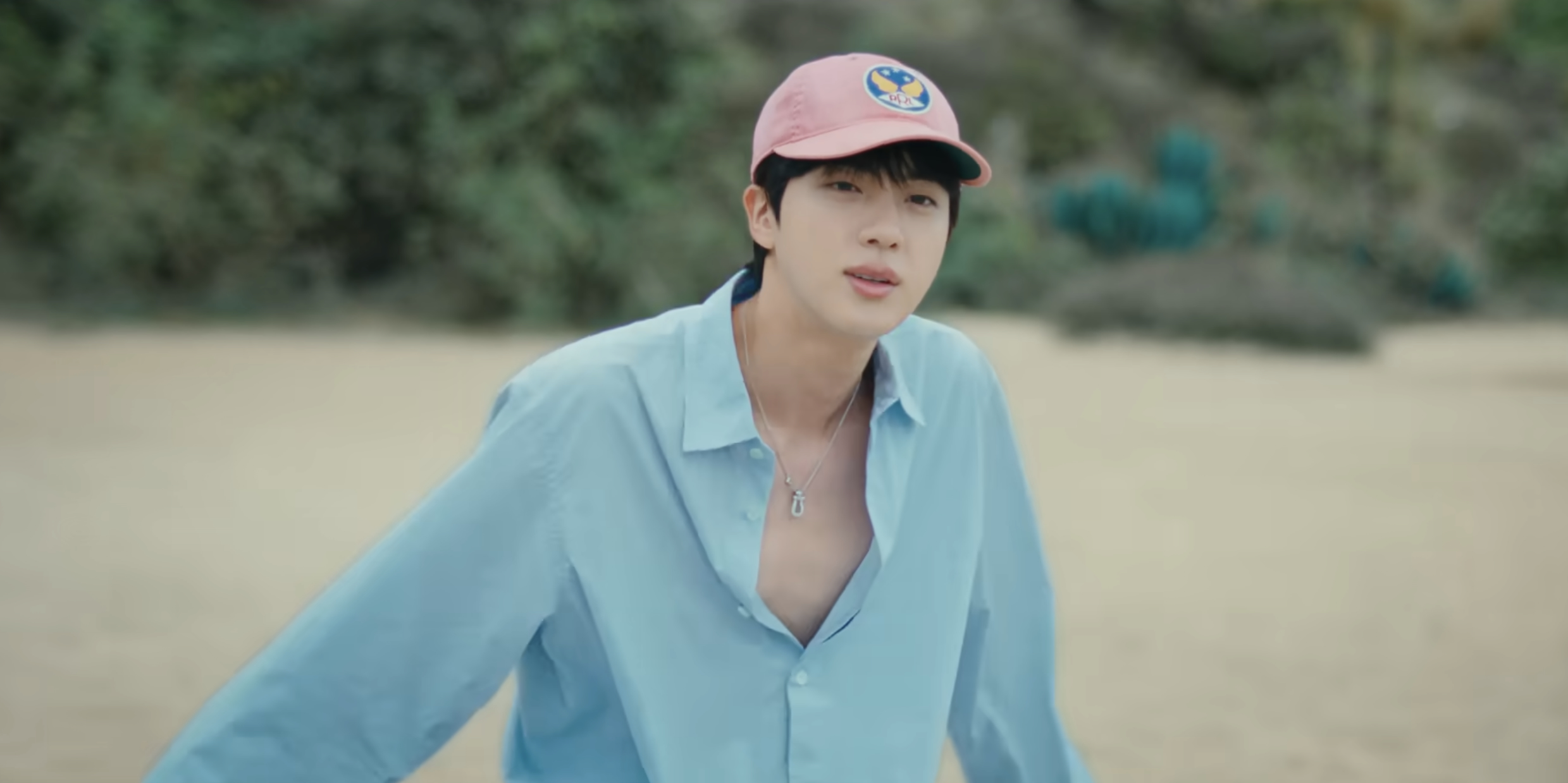 A Fashion Breakdown of BTS Jin's 'Running Wild' Music Video