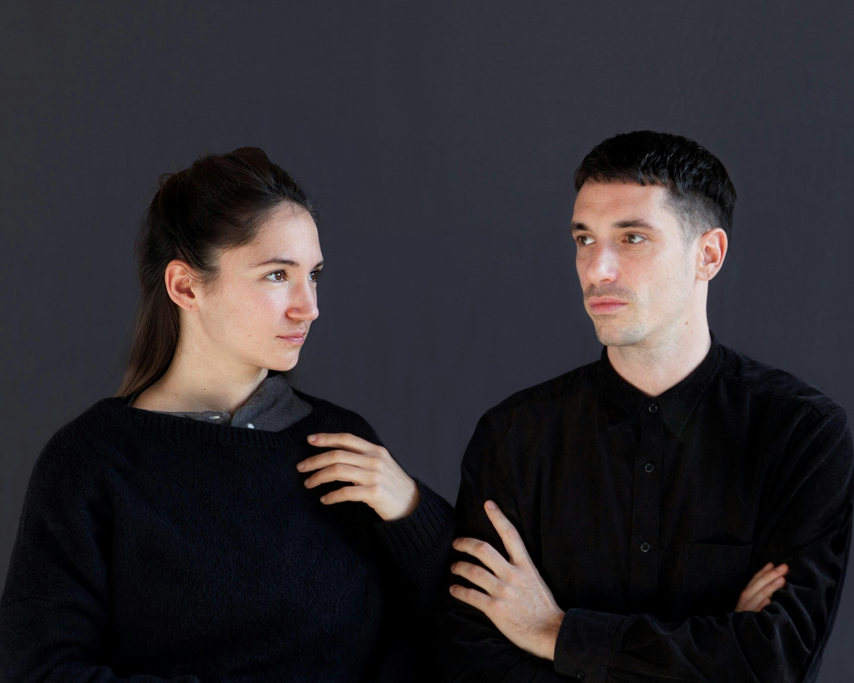 Ginevra Panzetti and Enrico Ticconi portrayed dressed in black 