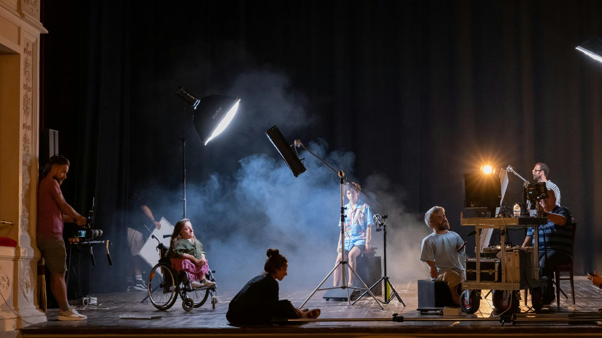 video-manifesto by Al.Di.Qua Artists  Performers are on a theater stage in different positions