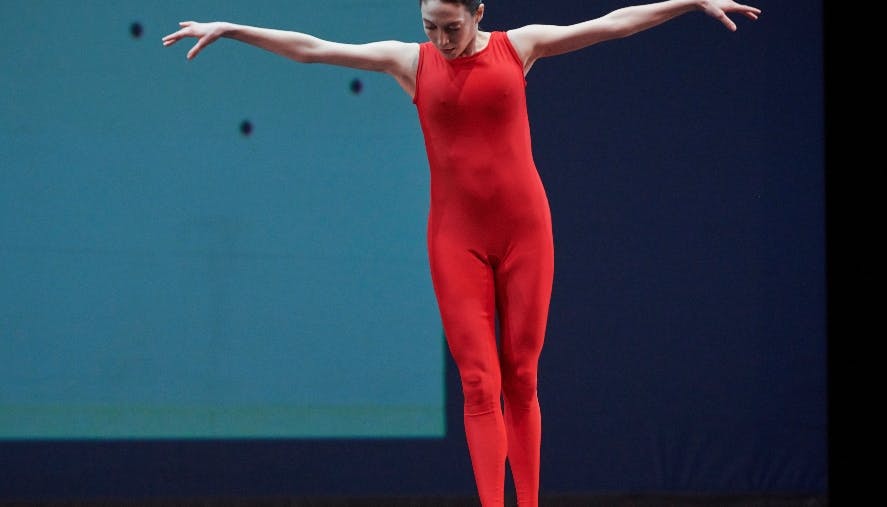 Dancer in tight-fitting Russian jumpsuit