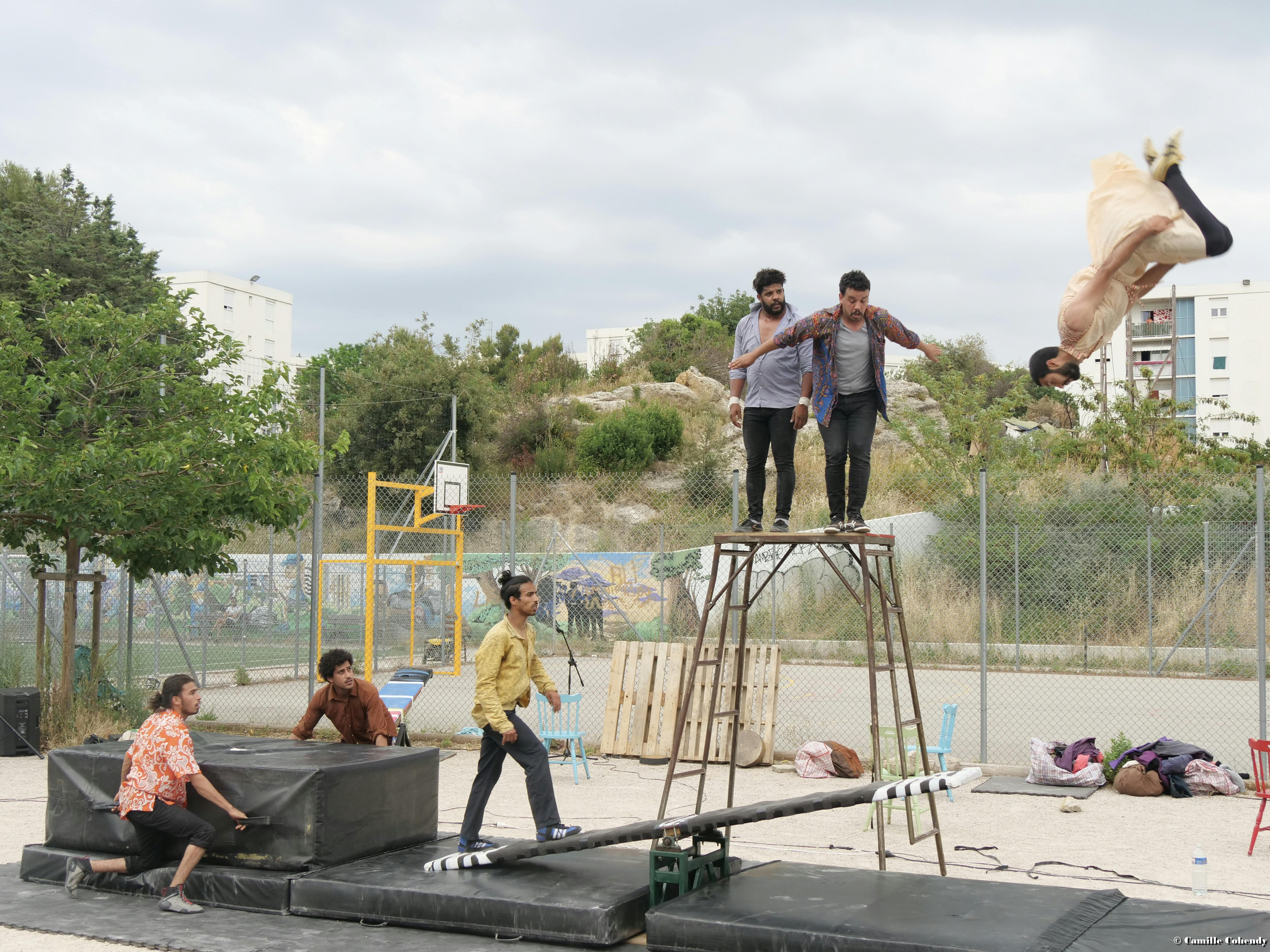 The dancers of the Colokolo company perform outdoors