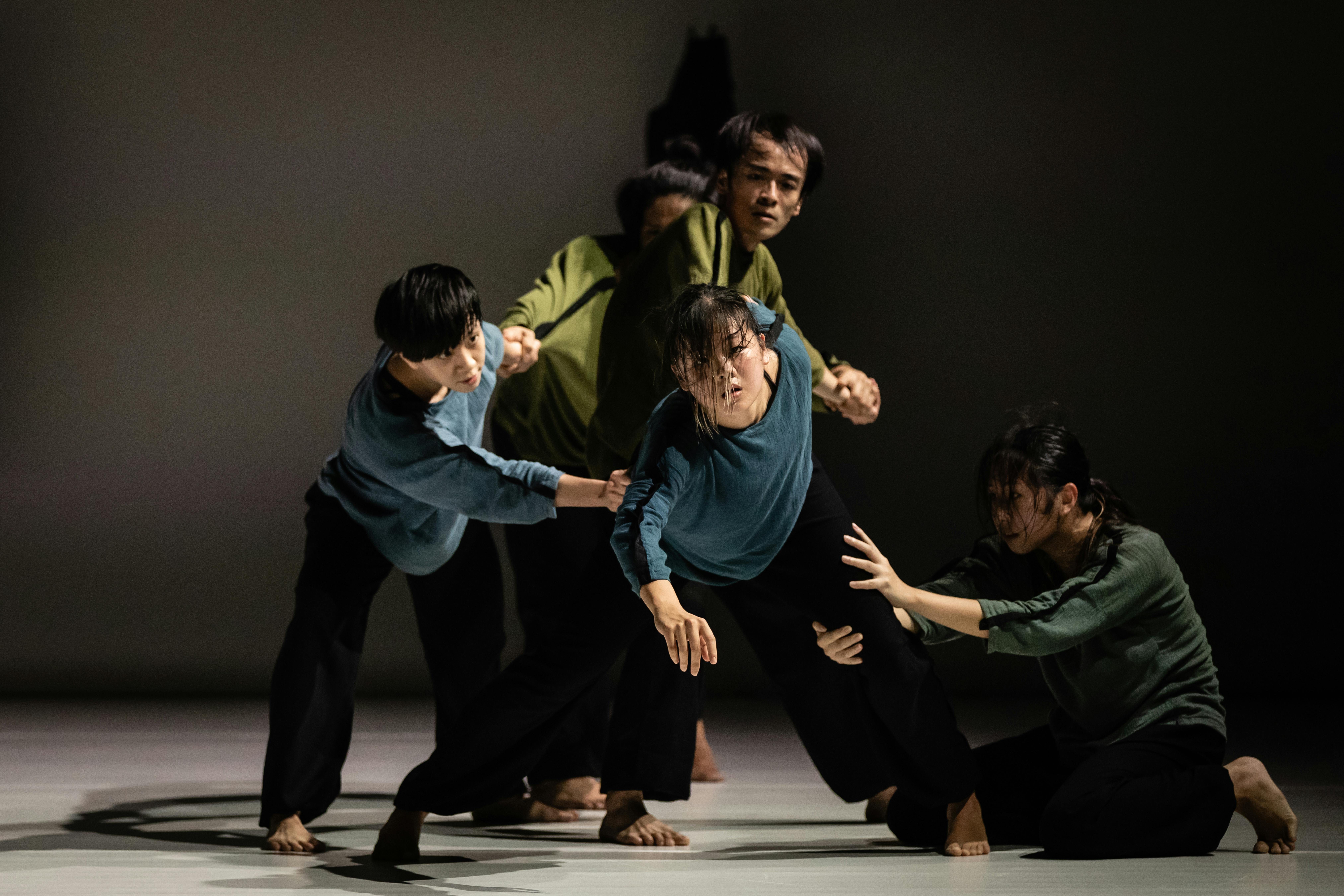 T.H.E. Dance Company dancers perform on stage