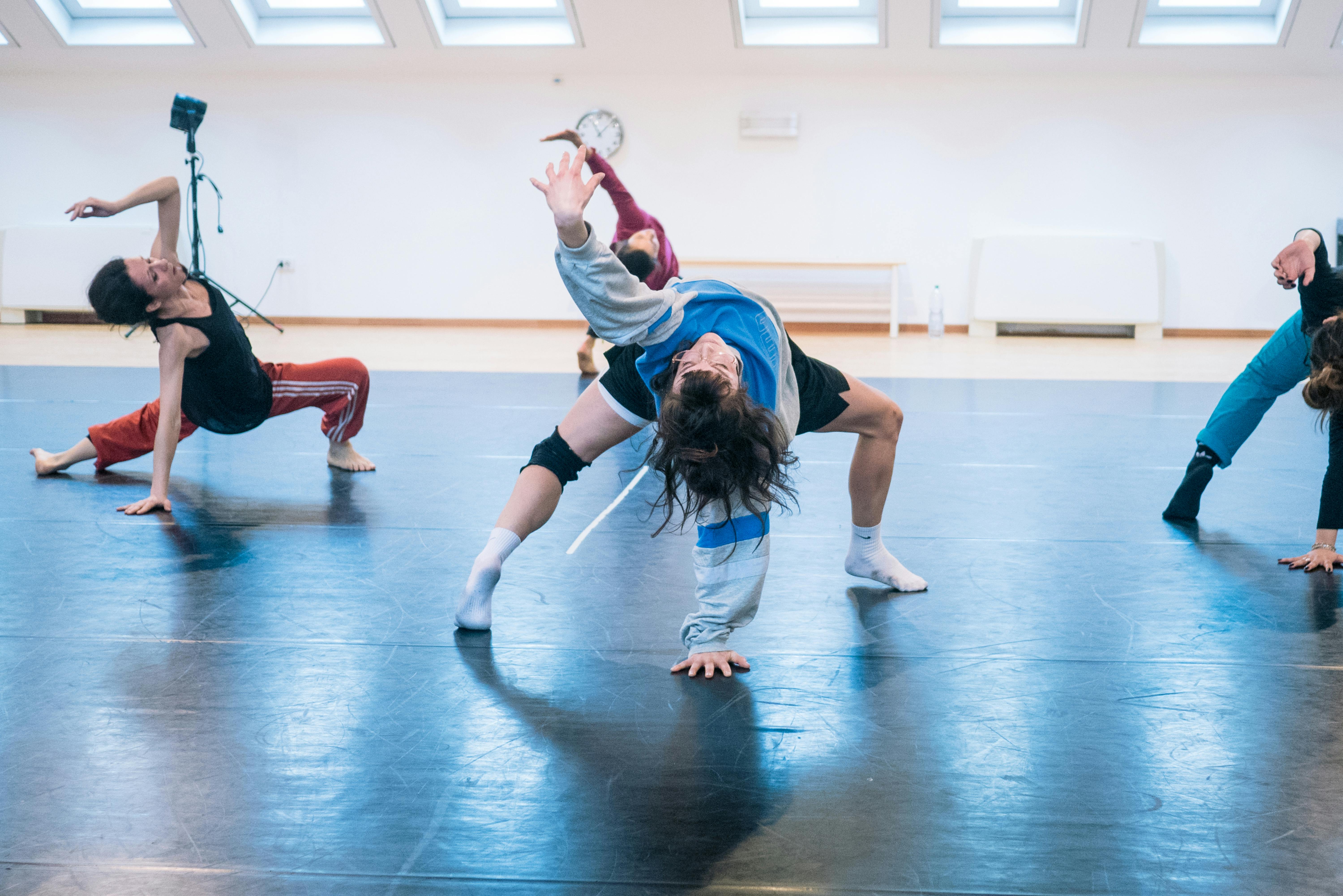 In the dance studio, dancers train