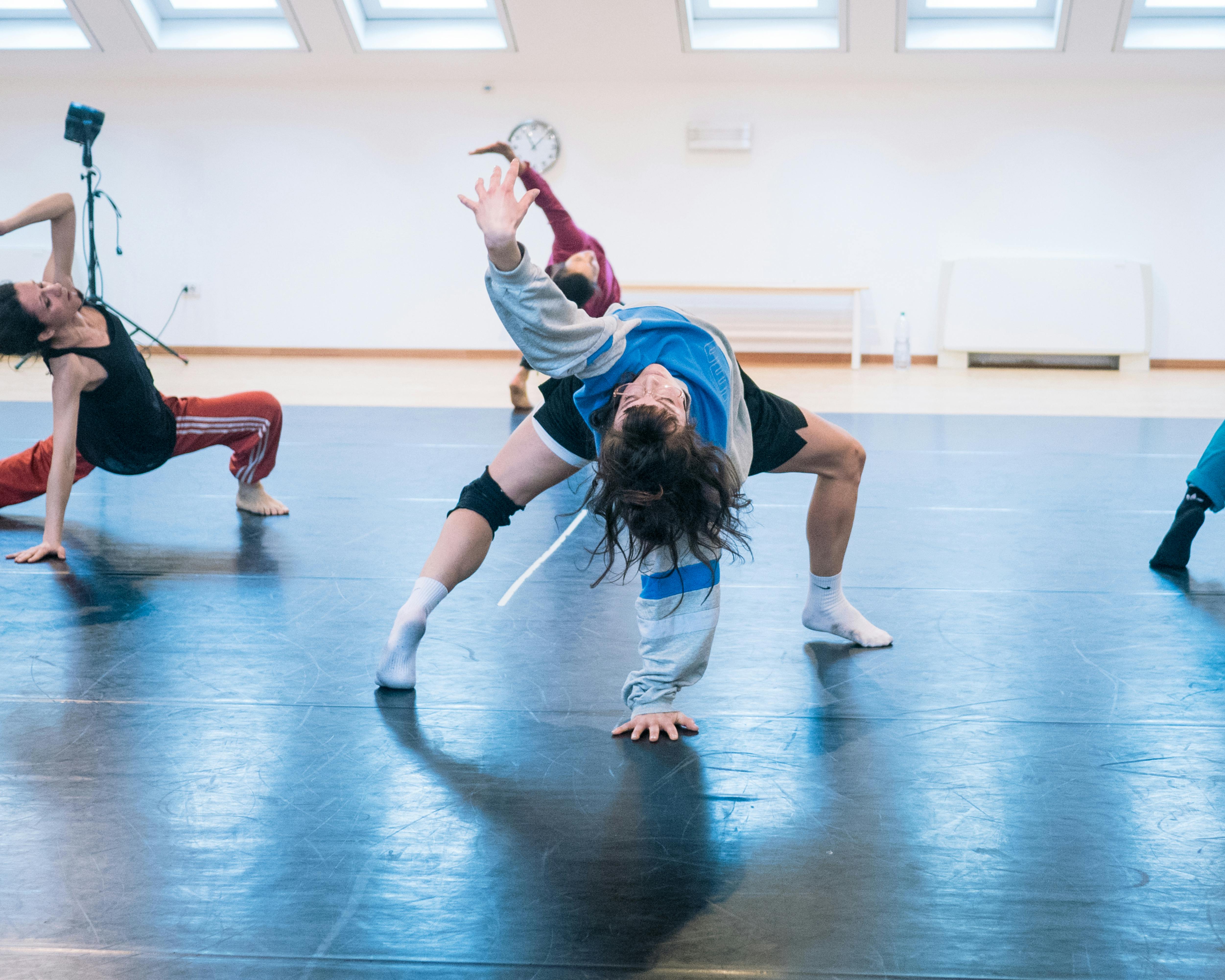 In the dance studio, dancers train