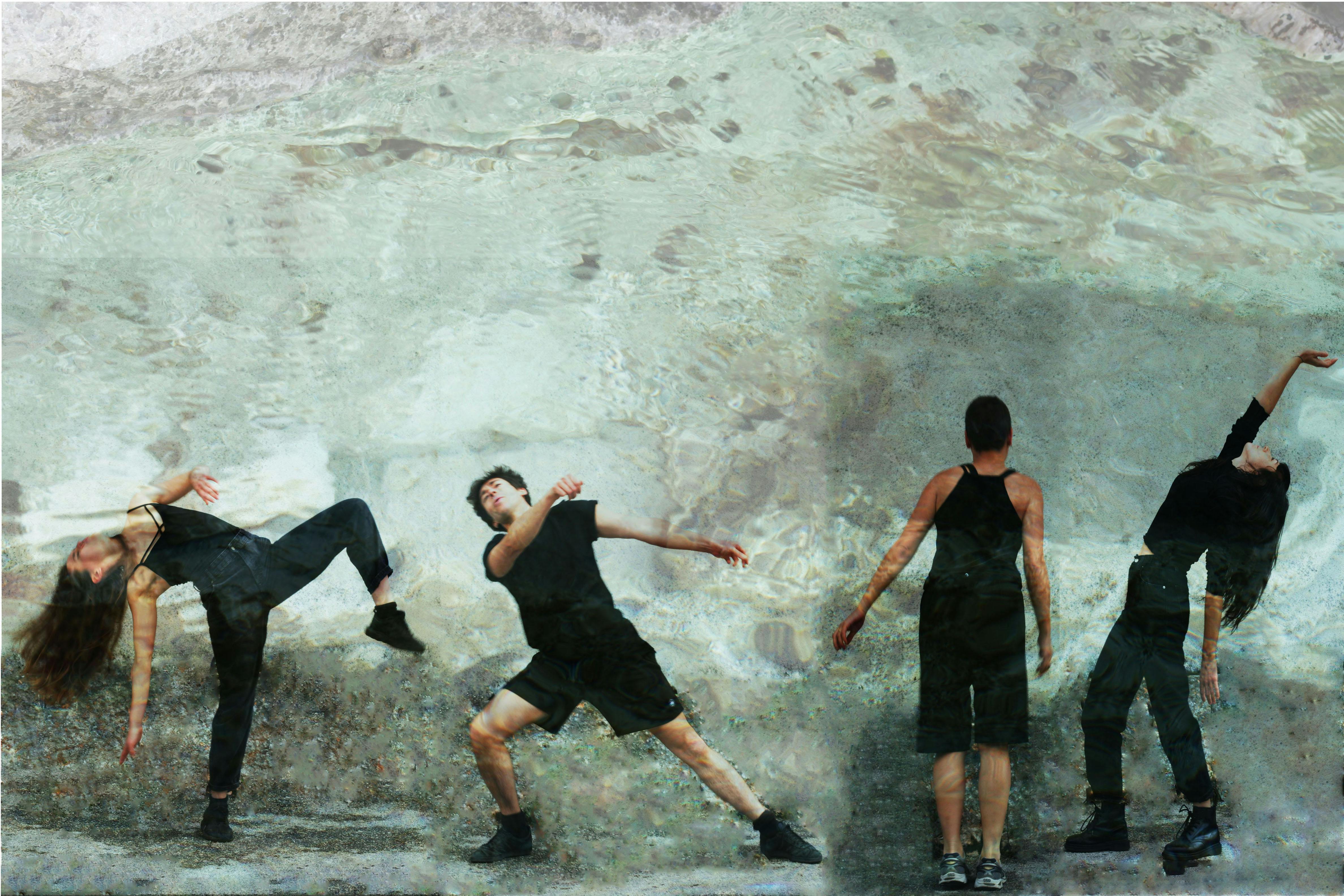 Four dancers moving - from right to left: two in a frontal position, one from the back and one from the side - with a background imitating the reflection of water