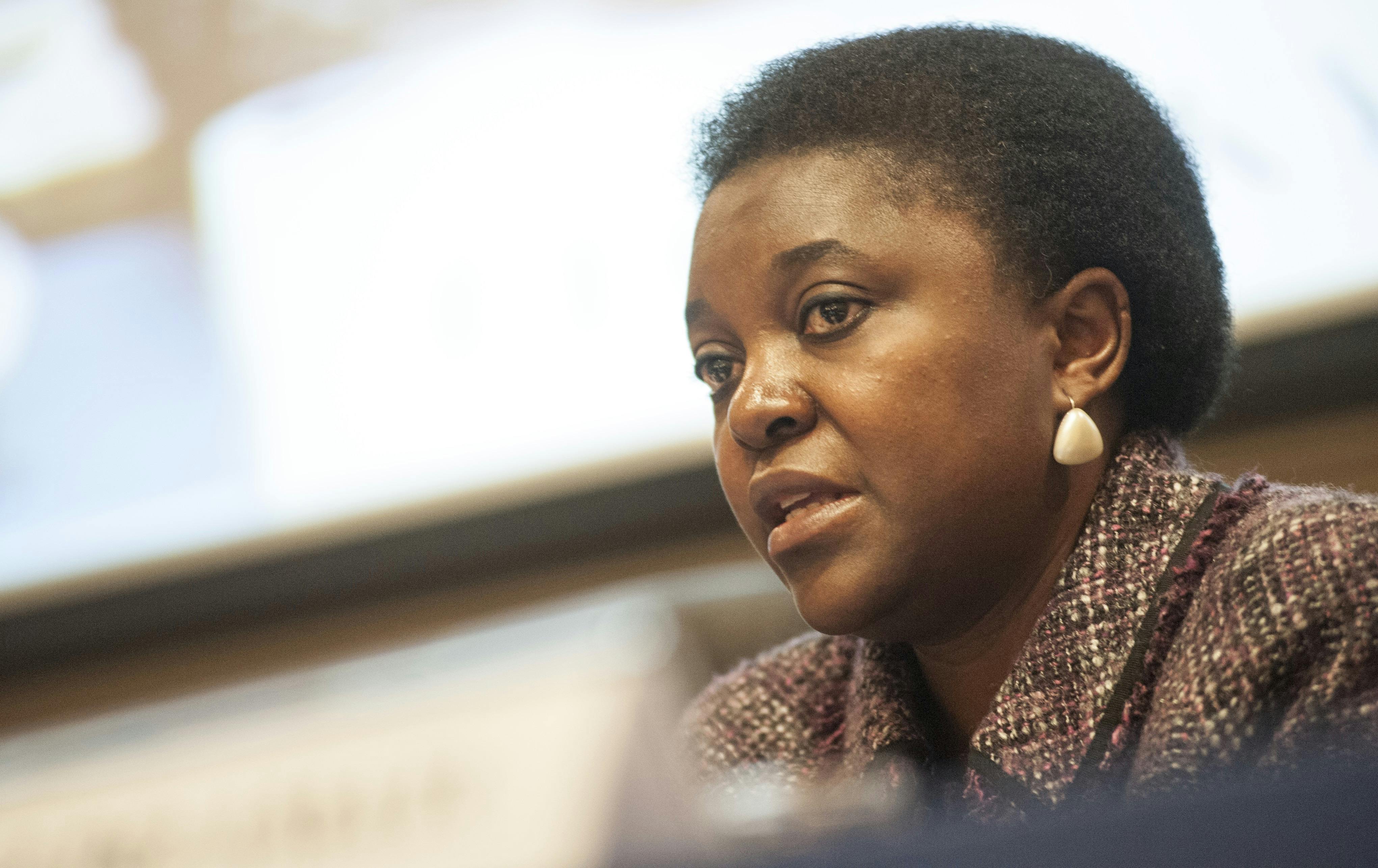 Cécile Kyenge in the foreground speaking